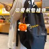 Nuevo colgante de peluche de diablito bola de carbón imitación de pelo de conejo rex para llavero de coche, colgante para mochila escolar, venta al por mayor