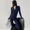 Conjunto deportivo de fitness para mujer estilo europeo y americano, conjunto de dos piezas con top de manga larga y cuello en V con cremallera, y pantalones acampanados adelgazantes