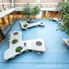 Banca rodeando árbol de fibra de vidrio para exterior, asiento para hoyo de árbol irregular, banco para parque comunitario, instalación de paisaje creativo con banco GRC