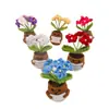 Planta en maceta tejida a crochet de lana nueva transfronteriza, maceta tejida creativa, maceta linda, planta en maceta nomeolvides que anima activamente