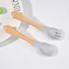Tenedor y Cuchara de Silicona de Grado Alimenticio con Mango de Madera para Niños Transfronterizos Set de Vajilla para Bebé Cuchara para Complemento Alimenticio de Bebé Cuchara Suave