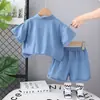 2025 Nueva Ropa Infantil Verano Manga Corta Solapa Oso Inglés Mezclilla Niños y Niñas Conjunto Bebé Color Sólido Conjunto de Dos Piezas