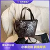 Comercio exterior este año explosiones populares bolso pequeño para mujer 2025 nuevo versátil bandolera mensajero nicho casual bolso de cubo