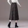 Saia xadrez de moda outono e inverno para mulheres, nova saia A-line modeladora de cintura alta 2026, caimento justo, saia de comprimento médio fluida