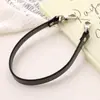 Nueva Cadena de Mano de Cuerda de Cuero Pu Muñequera Antiperdida Colgante para Teléfono Móvil Ins Versátil Decorativo para Bolso Doble Hebilla Colgante para Mujeres