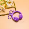 Nuevo llavero creativo de auriculares 3D, un accesorio moderno y genial para bolsos, joyería hecha a mano para manualidades y materiales para accesorios, al por mayor