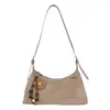 Bolsa de ombro de alta qualidade e estilosa para mulheres, nova coleção outono/inverno 2025, versátil para o trabalho e o trajeto, bolsa crossbody com design semelhante a um bolinho
