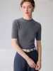 Nuevo suéter de cuello alto corto de manga corta 100% cachemira pura para mujer, base de punto acanalado de corte ajustado, top suéter versátil de color liso