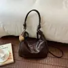 Bolsa Feminina Nova Outono 2026 Transfronteiriça, Bolsa de Ombro Transversal de Grande Capacidade para o Dia a Dia, Bolsa Estilo Bolinho Versátil e Fashion para Viagem
