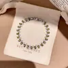 Pulsera con Cierre de Flor de Circonita Chapada en Oro Real de 18k Sentido del Diseño Pulsera de Nicho Lujo Ligero Sensación de Alta Gama Pulsera Retro