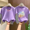 Camiseta de Manga Longa para Meninas Estilo Primavera/Outono 2026 Nova Camada de Base Estilosa para Crianças Top de Algodão Puro Top Falso Duas Peças