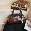 Bolsa de Axila Estilo Motociclista Design de Nicho 2026 Novo Modelo Bolsa Feminina Moda Transfronteiriça Versátil Bolsa de Ombro de Mão para Mulheres