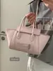 Bolso de Mano Texturizado de Moda Primavera para Mujer 2026 Nuevo Bolso Simple de Ala Bolso Tote Pequeño Versátil Venta al por Mayor