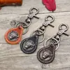 Joyas de Moda Transfronterizas de Alta Venta Colgante Creativo de Aleación con Cabeza de Toro Llavero Decorativo Accesorios de Cuero Tejido Adorno Colgante