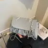 2026 Nuevo Bolso de Mujer Plegado de Moda Transfronterizo Elegante Bolso de Hombro con Cadena de Perlas con Patrón de PU