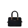 Bolsos de mujer de nicho 2026 nueva moda retro estilo commuter diario hombro bandolera bolso cuadrado pequeño transfronterizo