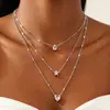 Cadena de Perlas Oceánicas de Venta Caliente Transfronteriza Europea y Americana Cadena para Clavícula de Mujer Colgante de Estrella de Mar y Concha Collar Multicapa Apilable Venta al por Mayor