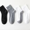 Calcetines de algodón de color liso de algodón de Xinjiang calcetines para hombre primavera y verano absorbentes de sudor calcetines de tubo de puesto Zhuji calcetines comerciales para hombre suministro de comercio exterior