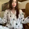Pijama de rayas con estampado de gato estilo coreano, conjunto de dos piezas de manga larga y pantalón largo para primavera y otoño, adecuado para que las niñas lo usen como ropa de casa
