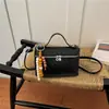 Bolso de Mano de Moda Bolso Pequeño para Mujer 2026 Nuevo Estilo Moderno Elegante Versátil para el Trabajo Bolso de Hombro Único Lujo Ligero Chic Bolso Cruzado