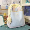 Nova mochila color block para estudantes com orelhas de coelho fofas, mochila escolar de alta aparência de desenho animado para meninas, mochila leve transfronteiriça para atividades ao ar livre