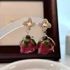 Aretes de Rosa Super Hada Estilo Mori Suave Diseño Retro de Nicho Pendientes Colgantes de Rosa con Gota de Flor Eterna