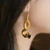 Brincos de Obsidiana Banhados a Ouro Cobra Misteriosa Rica Decoração Moda Jovem Joias da Moda Brincos Originais 2023