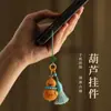 Llavero estilo chino, colgante de calabaza pequeña, accesorio para bolso, adorno cultural y creativo, cadena para teléfono móvil, regalo, nueva decoración de coche estilo chino