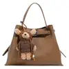 Bolsa de Hombro Cruzada Portátil para Verduras Estilo Nuevo Invierno 2025 Bolso de Moda de Alto Valor Tendencia para Mujer Ligero