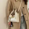 Bolso Cubo con Patrón de Lichi para Verduras para Mujer 2026 Nuevo Estilo de Gama Alta Nicho Retro Bolso de Hombro Bolso Cruzado