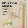 Soporte para cabezal de ducha Dopamine, diseño creativo de mariposa, no requiere taladro, ajustable, soporte universal para cabezal de ducha de baño