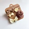 Accesorios para el cabello para niños de Amazon transfronterizo Lazo hecho a mano Diadema de nailon de alta elasticidad Diadema para fotos de bebé Juego de cinco piezas