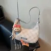 Bolsa Pequena Xadrez em Formato de Meia-Lua para Mulheres 2026 Nova Moda Versátil Bolsa de Mão para o Dia a Dia Bolsa de Ombro Bolsa Nova Lua de Nicho