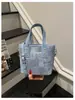 Bolsa de Mão Estilosa Feminina Cor Lisa 2026 Verão Novo Estilo Coreano Tendência Moda Estrela Pingente Menina Bolsa Balde Transversal