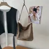 Bolsa de Ombro Casual tipo Balde de Grande Capacidade em Cores Contrastantes para Mulheres - Novo Estilo Verão 2026 - Bolsa Tote Simples e Fashion