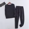 Liquidación Caliente Seda Traje de Hombre Ropa Interior Térmica Hombre Sin Rastro Calefacción Ropa de Otoño y Pantalones Parche Traje Caliente