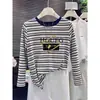 Camiseta de manga larga a rayas con bloques de color 2026 para mujer, diseño estilo ins, top de algodón puro de nicho, camiseta básica para otoño
