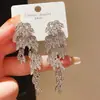 Pendientes de Borla de Pluma de Hoja de Diamante de Lujo Ligero Aguja de Plata Pendientes Personalizados Exquisitos de Gama Alta Nicho Retro Europeos y Americanos para Mujer