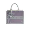 Bolsa feminina de nicho de alta qualidade, nova bolsa de mão com laço da moda de verão 2026, bolsa tote color block de bolinhas