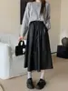Falda de cuero negra línea A, nueva colección otoño/invierno 2026 para mujer, falda midi de cuero PU de cintura alta, estilo casual, ajustado y acampanado