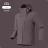 Chaqueta exterior 3 en 1 a prueba de viento e impermeable para hombre y mujer, con capucha, cuello alto, cierre magnético y construcción softshell; un conjunto de dos piezas adecuado para el montañismo