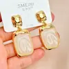 Pendientes Cuadrados de Resina Plegada con Borde Dorado Vintage, Estilo de Corte Francés Europeo y Americano, Pendientes Elegantes y de Alta Gama