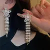 Brincos Europeus e Americanos Vazados de Estrela de Cinco Pontas Cheios de Diamante Exagerados Leve Luxo Elegante Longos com Franjas Brincos Transfronteiriços