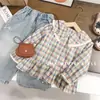 Nuevas camisas de primavera y otoño para niñas, camisas elegantes de manga larga para bebés, tops casuales de cuadros de primavera para niños, comercio exterior