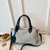 Bolso de hombro grande de estilo europeo y americano, tipo soft-shell, de gran capacidad, 2026, nuevo, bolso cruzado moderno y versátil para el trabajo, bolso de mujer