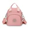 Bolso Pequeño de Lona para Mujer 2026 Verano Nuevo Estilo Mini Bolso de Hombro Casual Exquisito Multibolsillos Bolso Cruzado de Tela Oxford