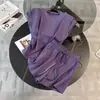 Conjunto deportivo estilo Chanel para mujer 2026, nueva versión coreana de moda, diseño adelgazante y rejuvenecedor, conjunto de dos piezas de pantalones cortos de manga corta