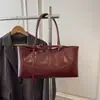 Bolso de Mano Vintage de Color Sólido para Mujer 2026 Nuevo de Gran Capacidad para el Trabajo con una Sola Correa Bolso de Mano Simple Versátil de Moda