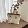 Bolso Retro de Gran Capacidad Transfronterizo para Mujer Verano 2026 Nicho Versátil Bolso Tote para Viajes Cotidianos Bolso de Hombro de Moda de Gama Alta