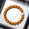 Producto natural completo cuenta ligera cabeza de mono pulsera de mano barril viejo juego de texto para hombre cuentas pequeñas de nuez cuentas cuentas pulsera de juego al por mayor